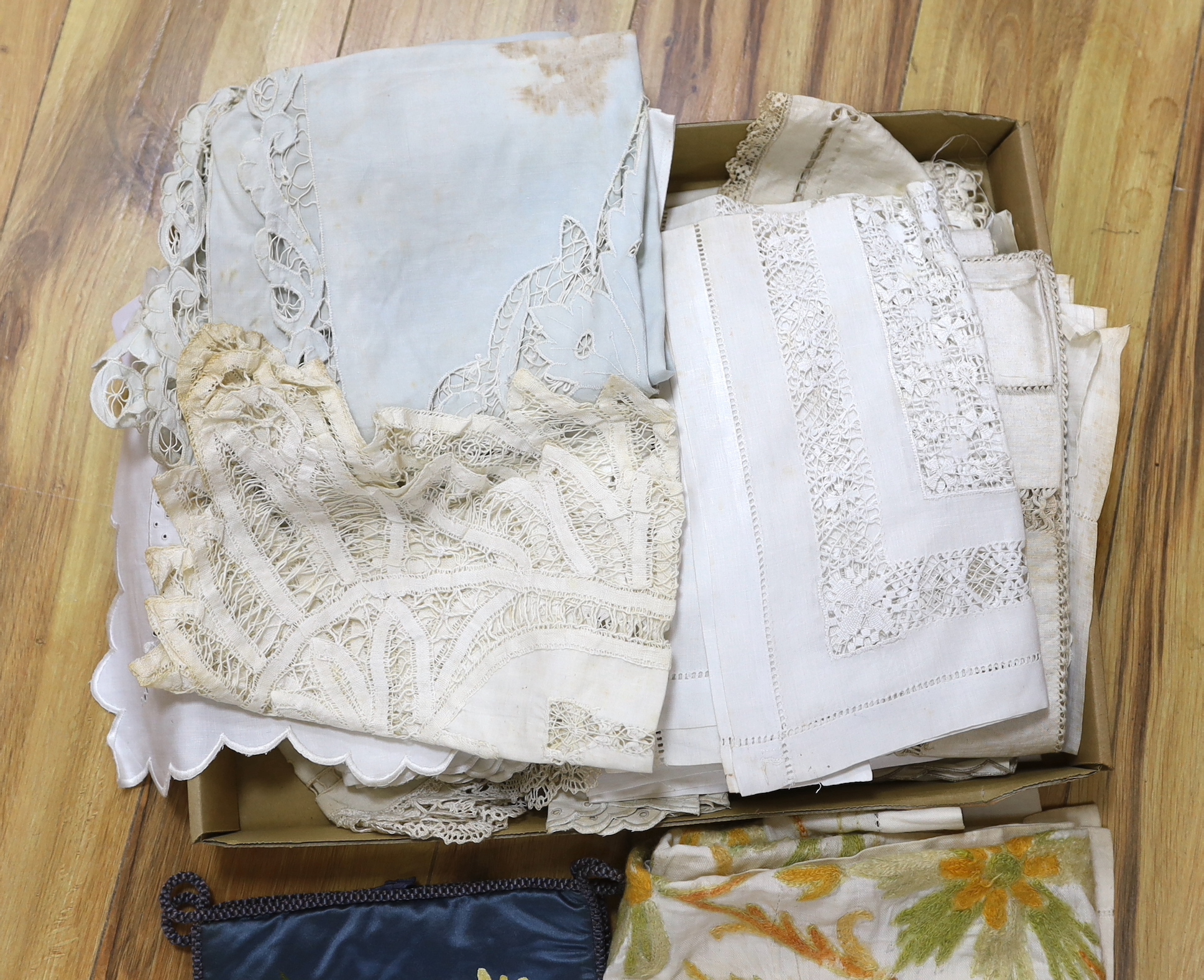 A small group of embroidered, drawn thread and cut-worked table linens
